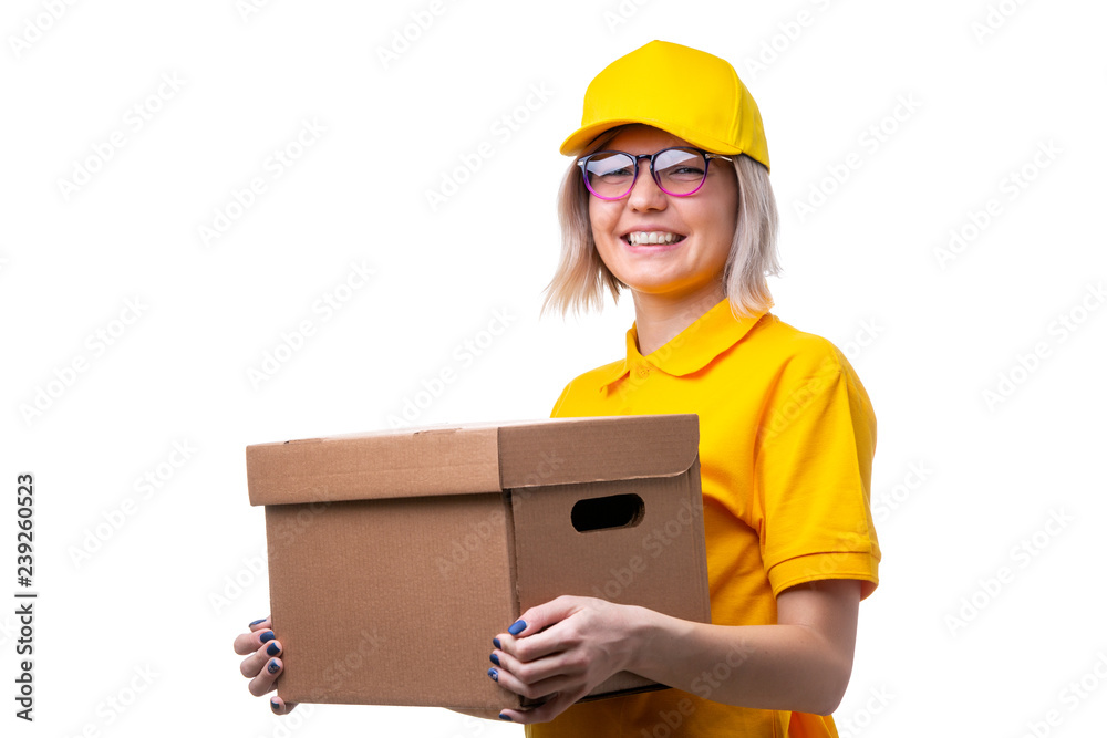 Image of courier woman with glasses and yellow T-shirt with cardboard box in her hands Image of courier woman with glasses and yellow T-shirt with cardboard box in her hands