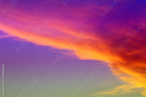 marvellous vivid sun colored clouds on the sky for using in design as background.