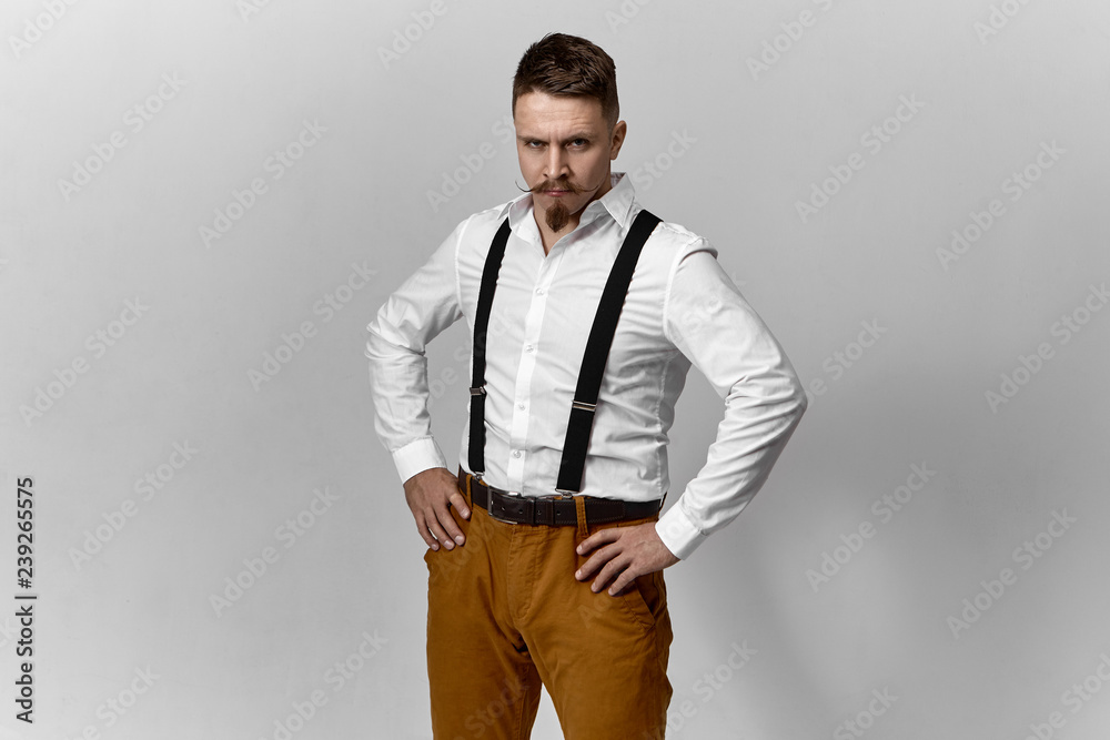 Man in white dress shirt and brown pants standing on brown grass field  during daytime photo  Free ישראל Image on Unsplash