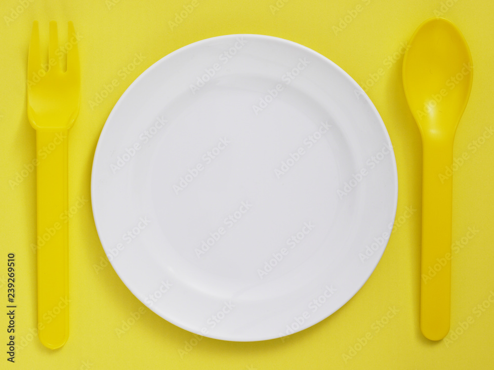 empty plate with fork and spoon empty plate with fork and spoon