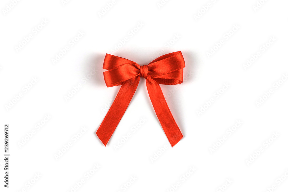 Red silk gift bow isolated on white. Red silk gift bow isolated on white.