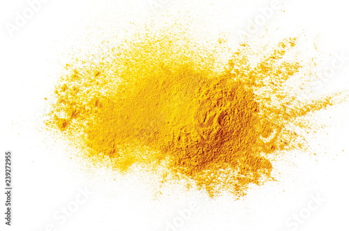 Turmeric powder pile isolated on white background, top view photo