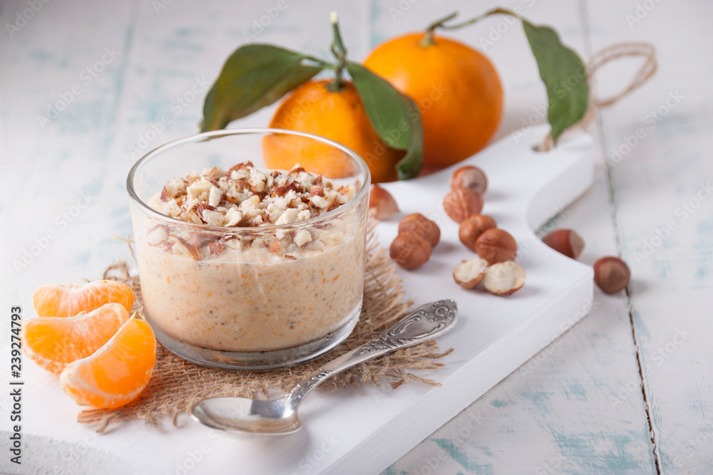 Smoothie of tangerine  and hazelnuts