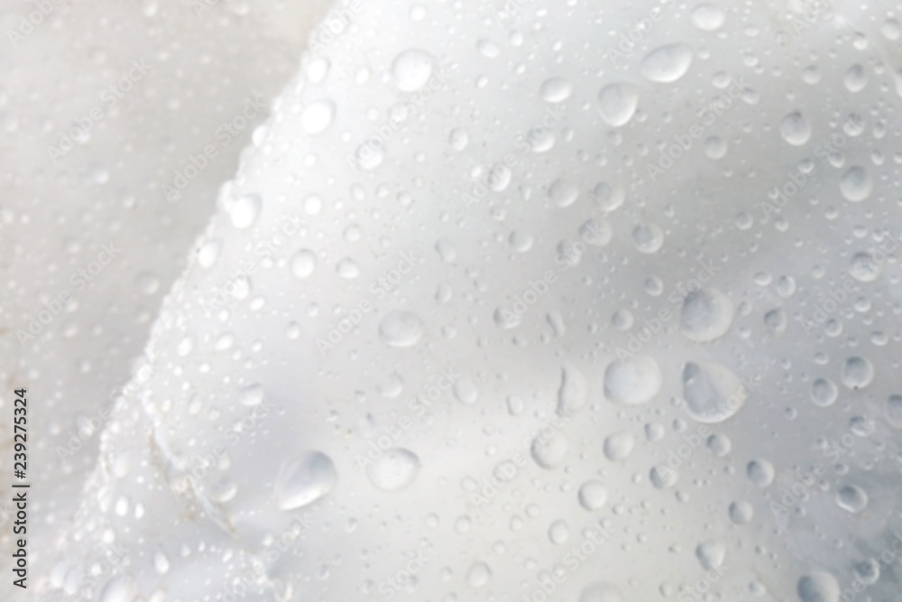 Drops on a stele blurred image of dew out of focus close up
