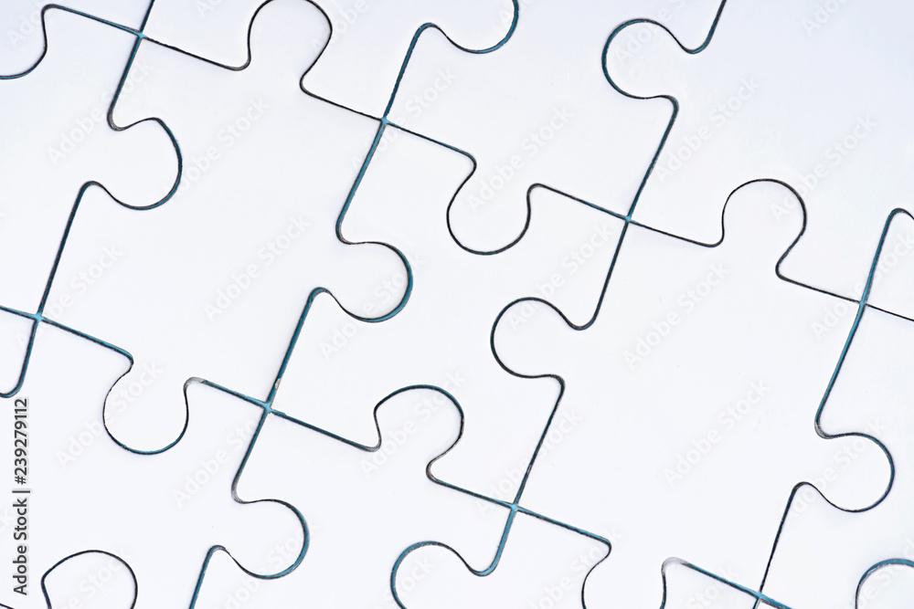 full frame of arranged white puzzles backdrop full frame of arranged white puzzles backdrop