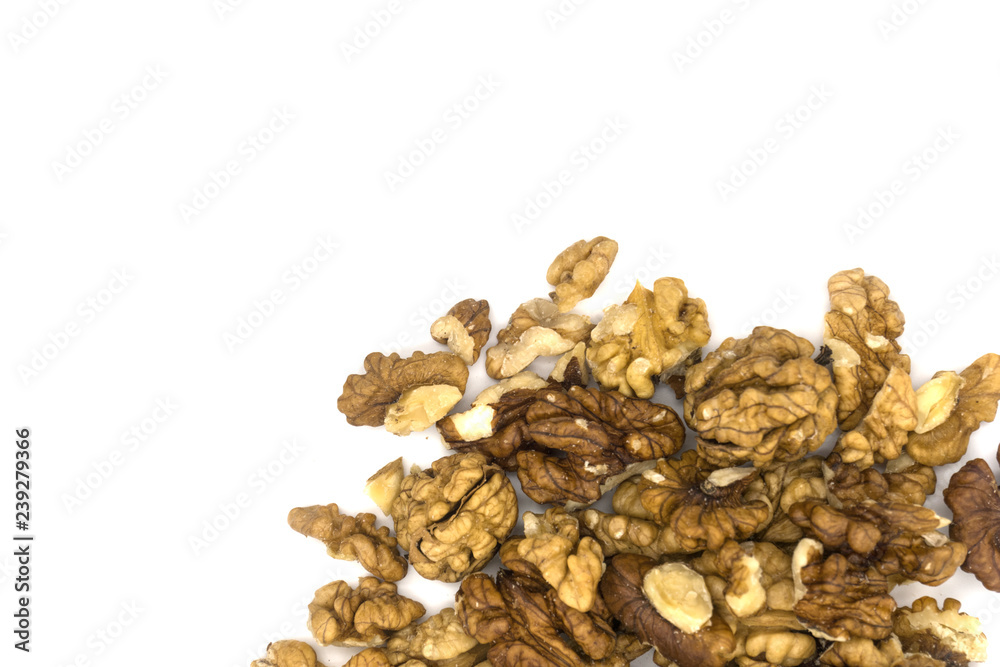 Peeled walnut on white background