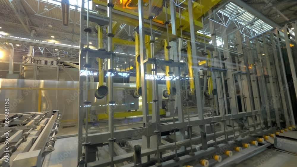 Industrial equipment for transportation sheet of glass in manufacturing hall Industrial equipment for transportation sheet of glass in manufacturing hall