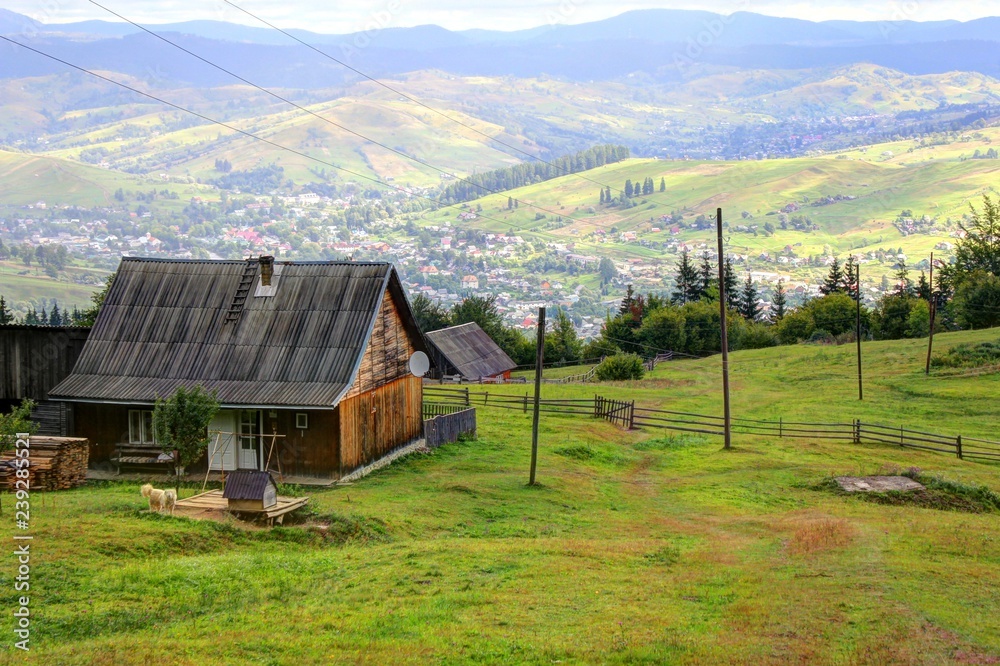 Ukrainian rural landscape in summer from above, village houses on the river bank in greenery Ukrainian rural landscape in summer from above, village houses on the river bank in greenery