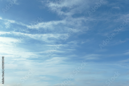 Light blue sky with light clouds