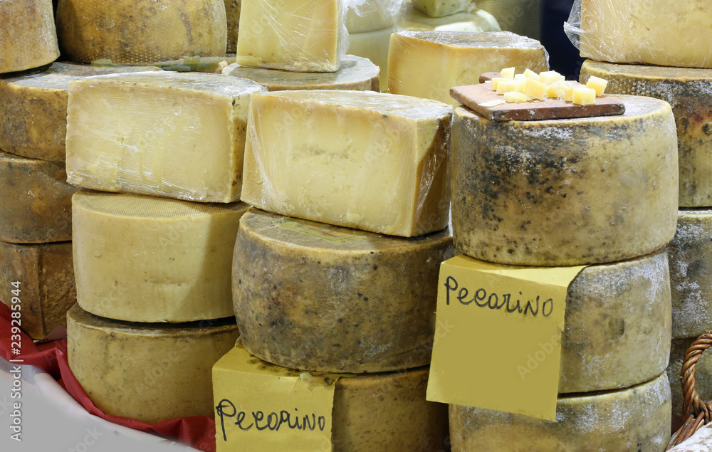 italian cheeses for sale and the text Pecorino - obrazy, fototapety, plakaty 