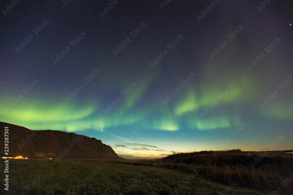 Aurora Borealis, northern lights at Reine, Hamnoy, Lofoten islands, Norway