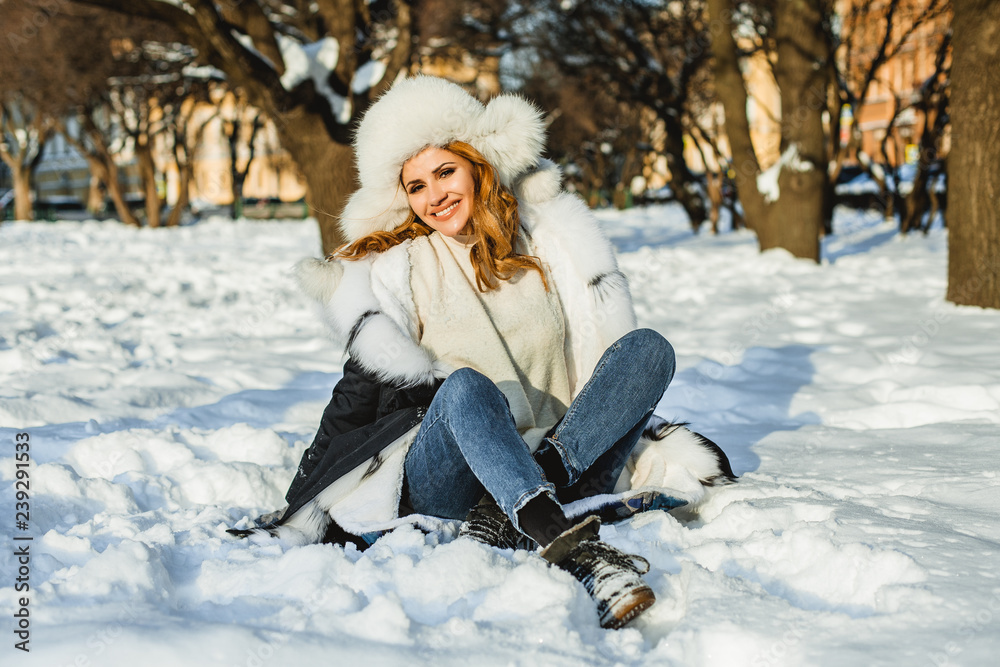 Pretty winter woman in winter city outdoor Pretty winter woman in winter city outdoor