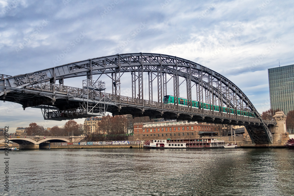 Naklejka premium Metro crossing Austerlitz viaduct in Bercy - Paris, France