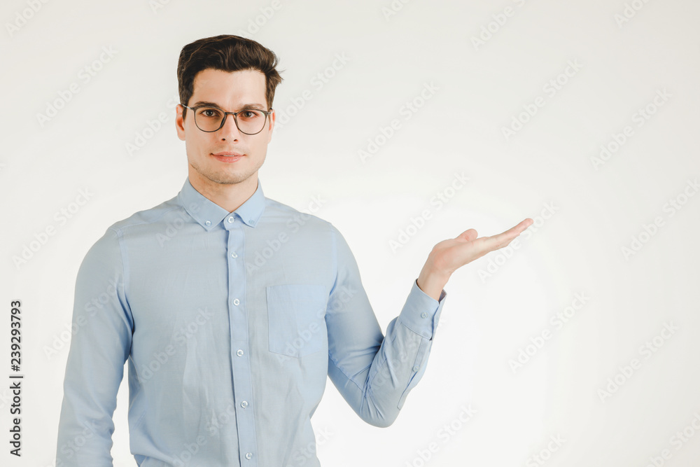 Cute man in action of hand presenting. Cute man in action of hand presenting.