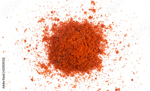 Pile of red paprika powder isolated on white background. Top view photo