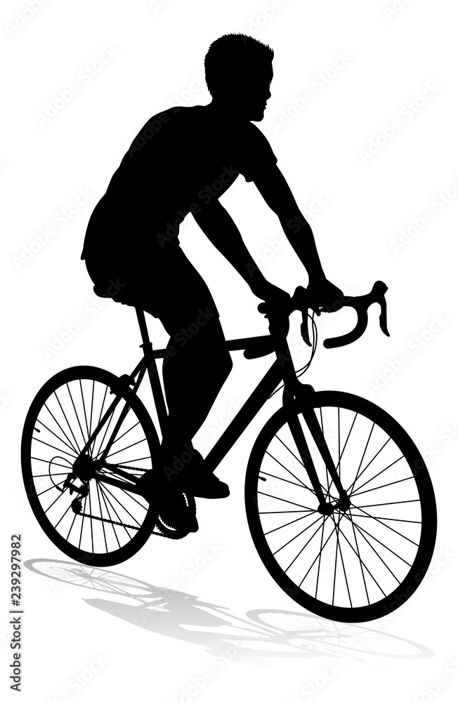 Fototapeta premium A bicycle riding bike cyclist in silhouette