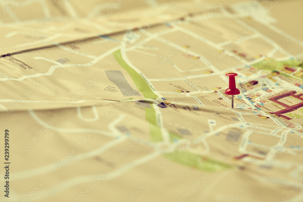 travel concept - small toy car on the map travel concept - small toy car on the map