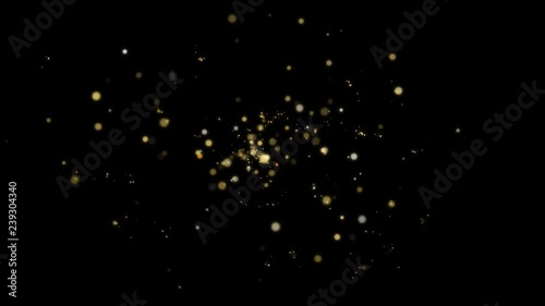Golden dust and glowing sparks fly in center. Bokeh effect. Glitter abstract background for celebration or party. Gold particles