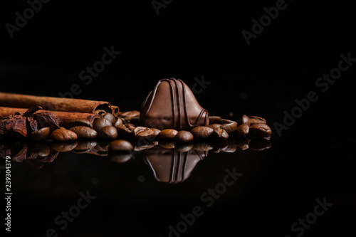 candies, chocolate, filler, cream, coffee (Black background). copy space