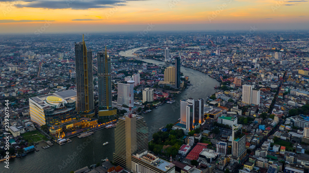 Bangkok City at evening and Chaopraya River, aerial view, Bangkok, Thailand.