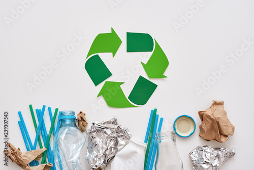 Garbage sorting saves the world. Crumple foil, paper and plastic