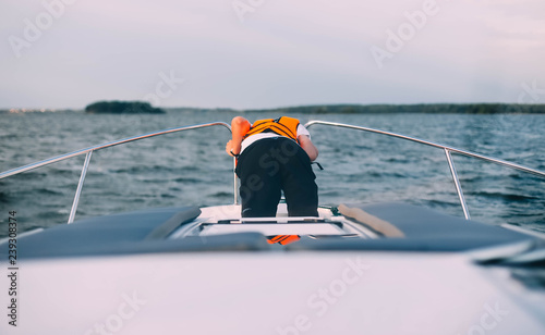Obraz na płótnie man sick on a yacht at sea. Seasickness. Danger of traveling by boat, swayed. w salonie