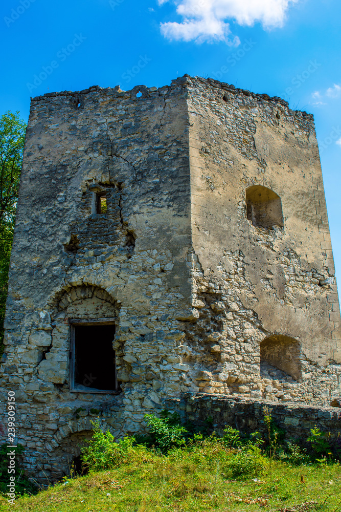 Photo of ancient stone castle tower in Krivche