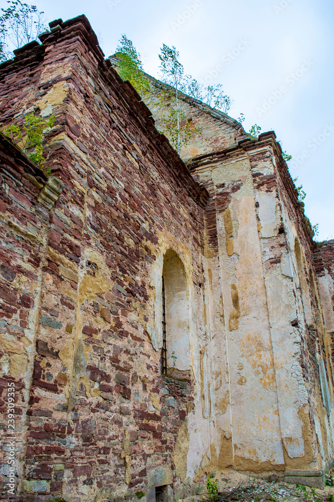 Photo of ancient stone Roman Catholic church in Nyrkiv