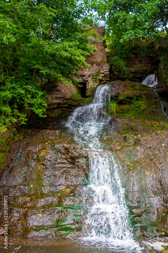 Photo of high waterfall in the mountains