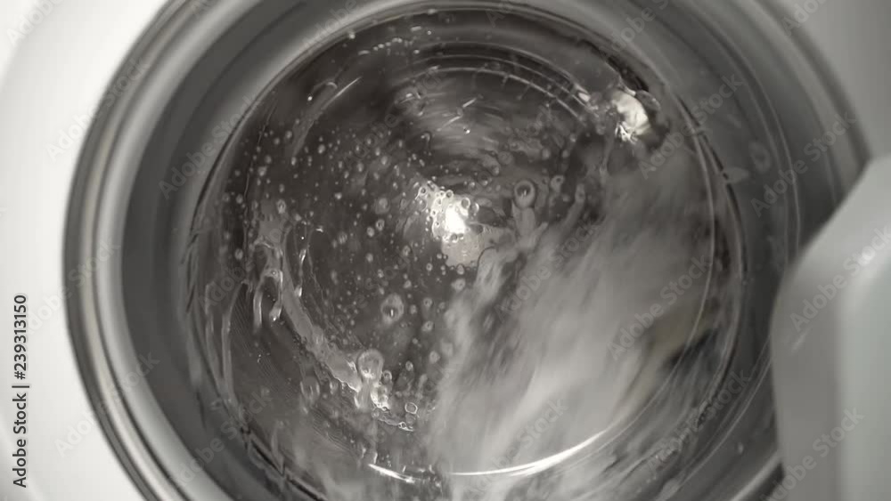 Process of washing in the washer, in the laundry, washday, using a washer Process of washing in the washer, in the laundry, washday, using a washer
