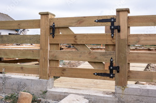 Forged hinges. Forged hinges on the fence ranch style.