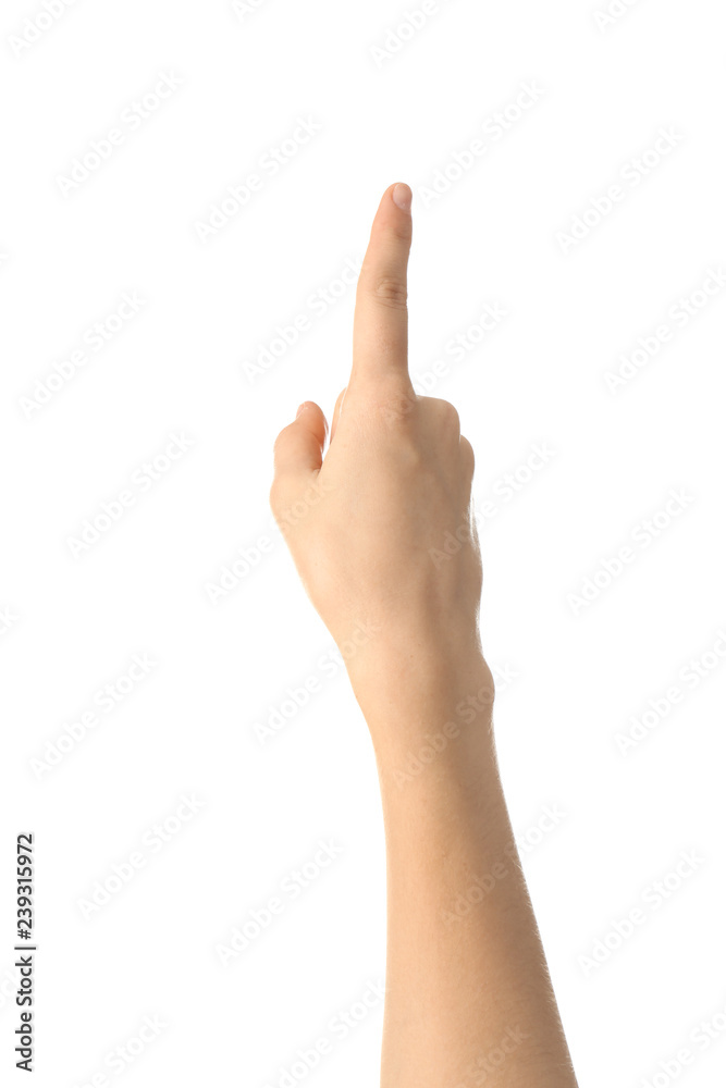 Female hand pointing at something on white background Female hand pointing at something on white background