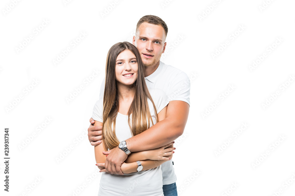 Love and family concept. Smiling couple hugging isolated on white background Love and family concept. Smiling couple hugging isolated on white background