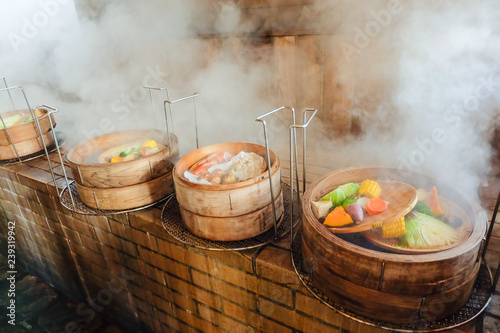 Hot steam to steamed vegetables and seafood without oil ,It is good for health.Japanese call 