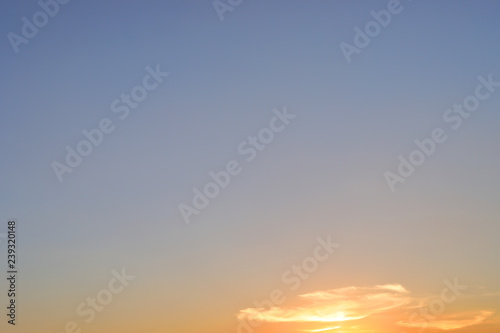 orange sun light on beautiful sunset clear blue sky background