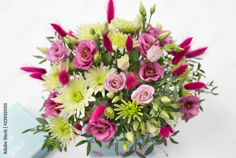 joyful floral arrangement in a gift box