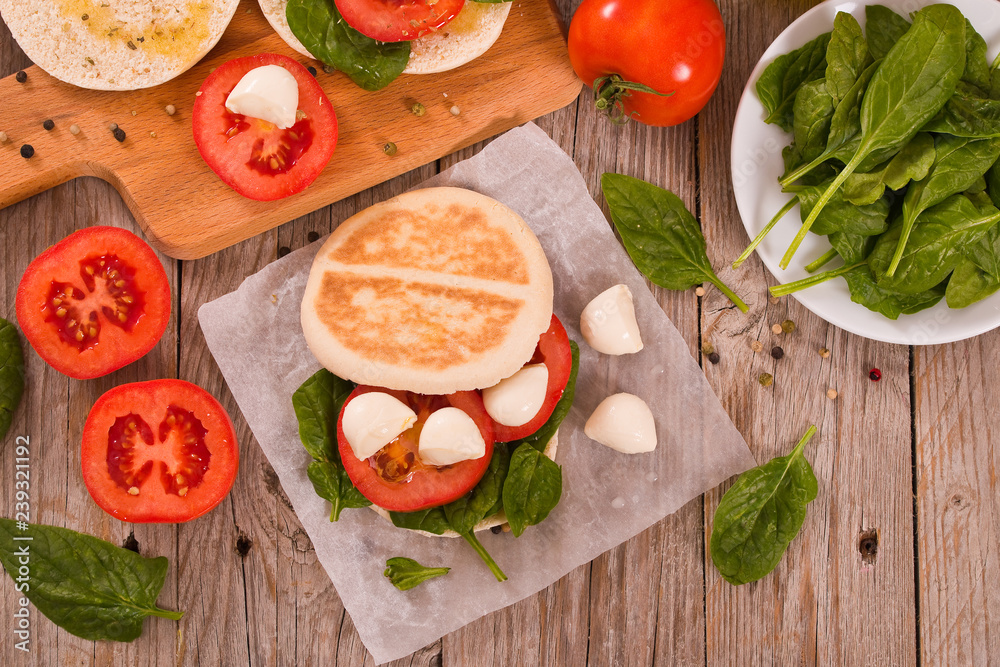 Tigella bread with spinach and tomatoes. Tigella bread with spinach and tomatoes.