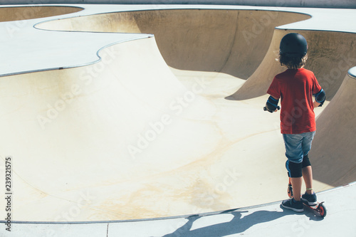 Child in the urban skate park