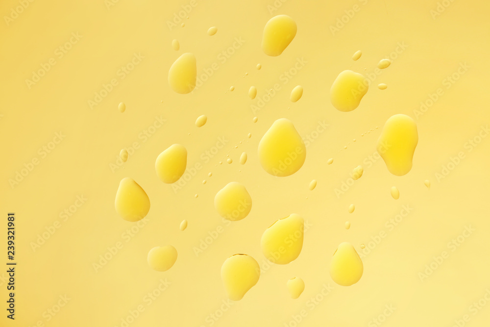 Drops of oil on color background Drops of oil on color background