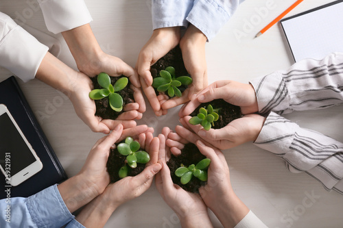 Business people holding gre...