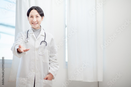 Doctor Asian woman, medical professional gesture up confidence Let the patient .