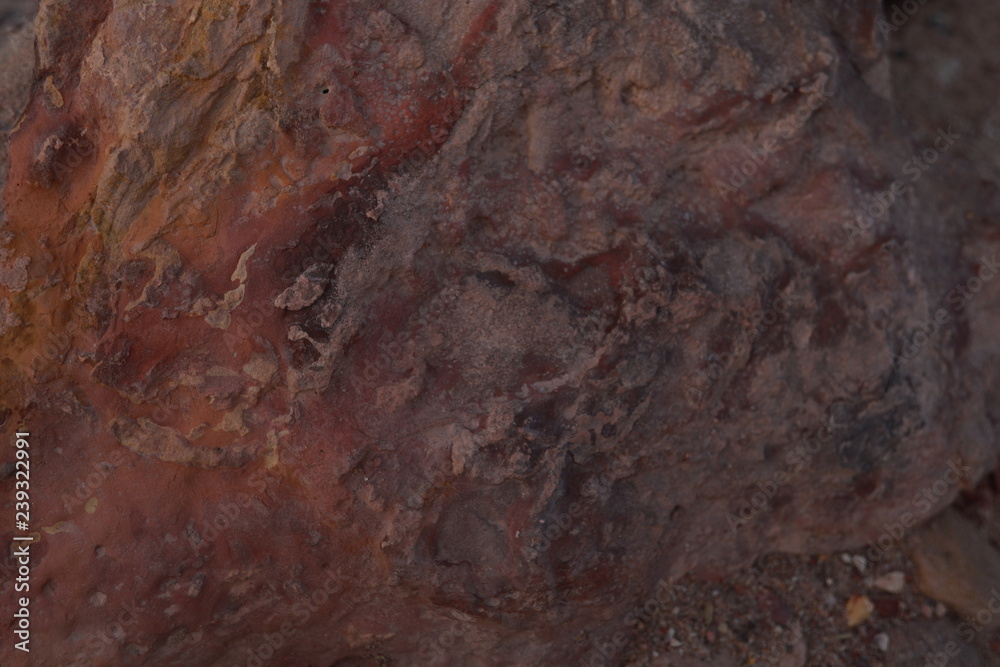 Obraz premium Red and brown big stone