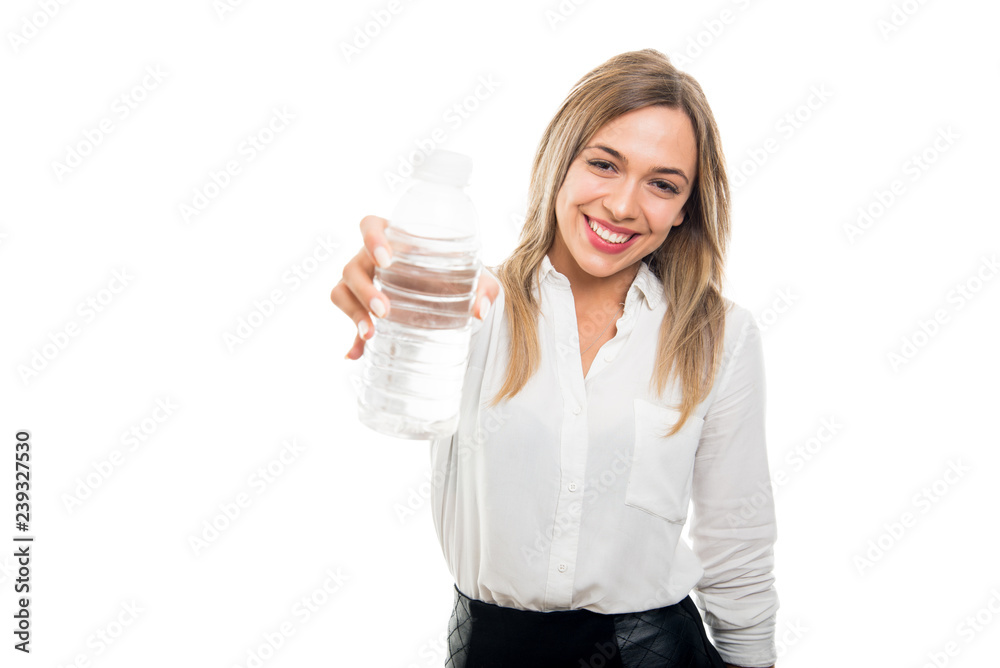 Portrait of beautiful business woman offering bottle of water Portrait of beautiful business woman offering bottle of water