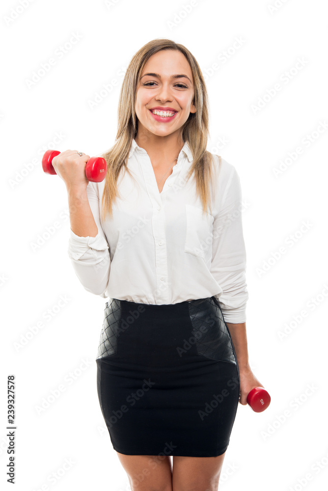 Portrait of beautiful business woman training with dumbbells Portrait of beautiful business woman training with dumbbells