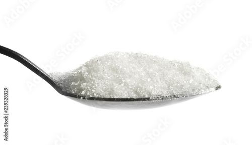 Spoon with sugar on white background