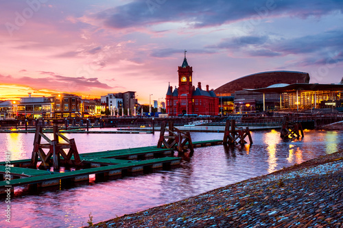 Waterfront at night in Cardiff, UK. Sunset colorful sky with Wales Millennium Center photo