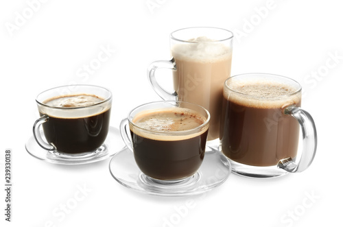 Fototapeta Naklejka Na Ścianę i Meble -  Glass cups with tasty aromatic coffee on white background