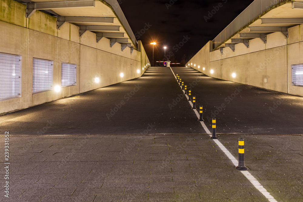 Evening photo of the entrance and exit of a parking garage in Zoetermeer, Netherlands