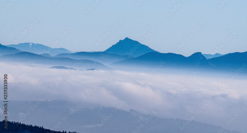 Velky Choc with other hills around from Lysa hora hill in winter Moravskoslezske Beskydy mountains in Czech republic