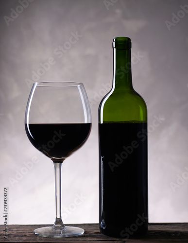 Red wine bottle and wine glass